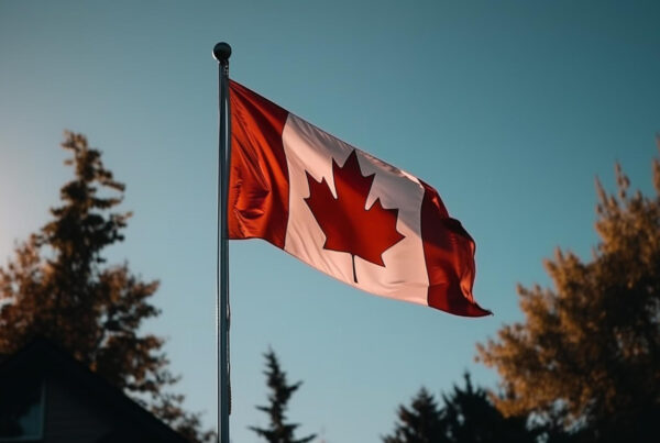 patriotic canadian flag waving after spousal sponsorship immigration