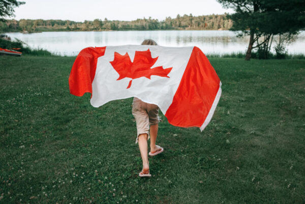 student in Canada with flag